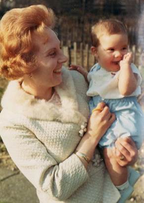 Peggy holding adored nephew Gareth on her wedding day