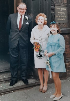 Peggy and husband Jim on their wedding day, with bridesmaid Peggy's cousin Sandra