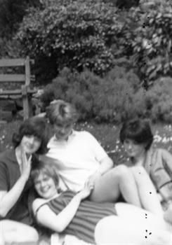 Marg, Wendy, Gill & Sue lounging around near Langland Bay Tennis Courts 1965