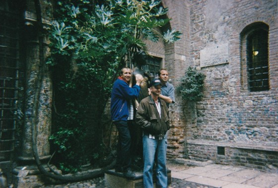 At the statue of Juliet in Verona Italy with Terry Higgins and Mike Maulden