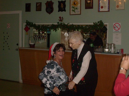 069Mom and Sandy dancing@xmas party