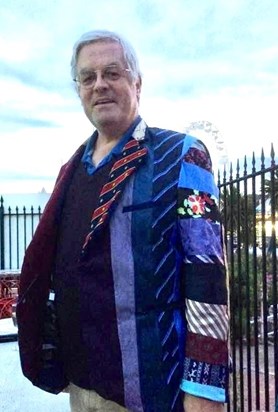A lovely memory of James in his ‘coat of many ties’ celebrating his retirement. This was designed and handcrafted by his niece, Helen. 