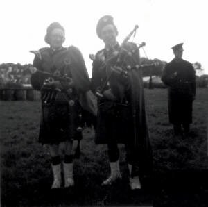 Tommy with another member of the pipe band
