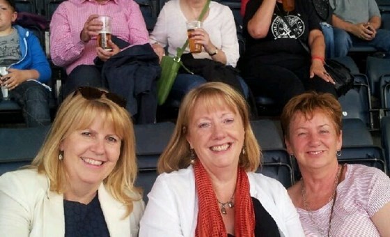 At Hampden Park for Bruce Springsteen, 2013. Lorraine's not really wearing a giant black hat!