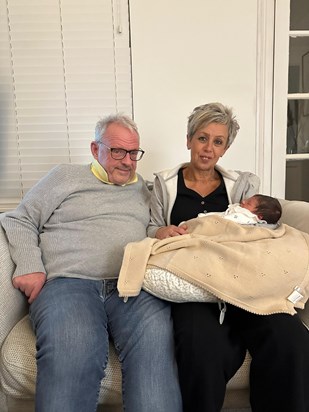 Mike and Alison with their first grandchild.