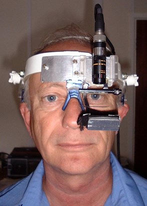Mike in 2001 wearing one of the eye trackers he built in the late 1990s