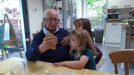 Looking at a stag beetle with grandchildren kew 2019