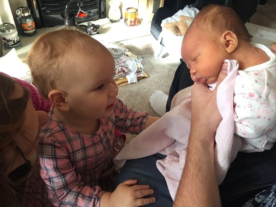 Sophia meeting her baby cousin 