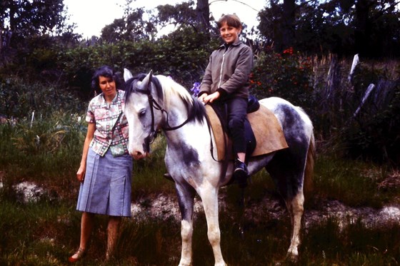 Kevin on horse with his mother in Australia
