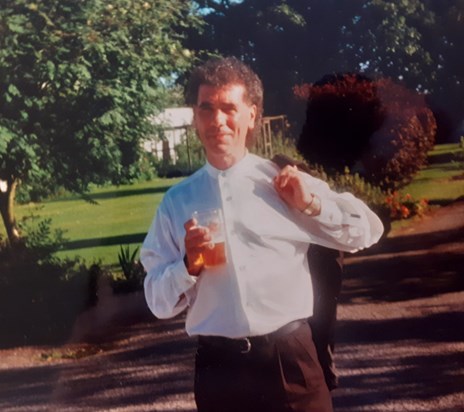 Greg at Bridges Wedding what a cute face  and with drink in hand cheers Greg love you