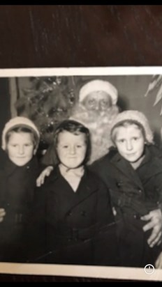 Visiting Father Christmas aged about 7 - Liz Guy (Ramstedt), Tim Hall and Sue 