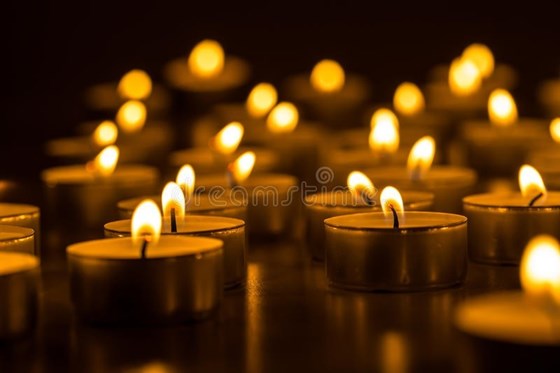 christmas candles burning night abstract candles background golden light candle flame 62469445