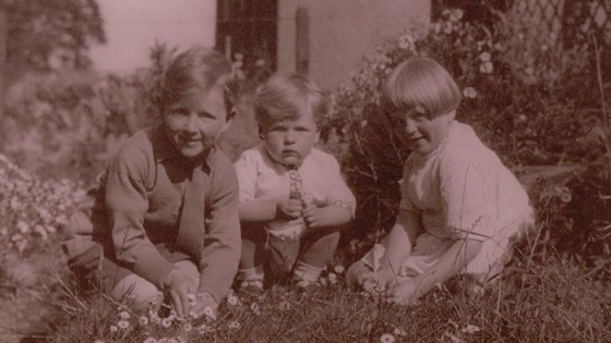 Rod as a young child with elder twin siblings Neil and Janet