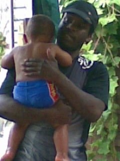 Your nephew Delroy with his son, Joshua. xx