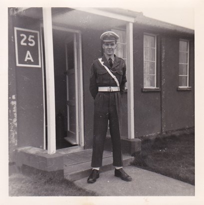 Graham Routledge standing proud in his uniform.