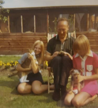 Me, my sister and dad with our family pets