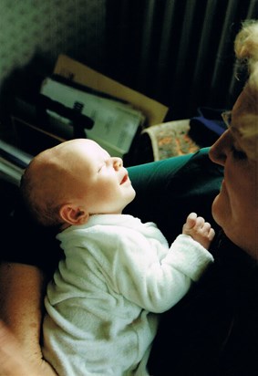 Diane holding her first grandchild - Owen O'Kane Gray 1998