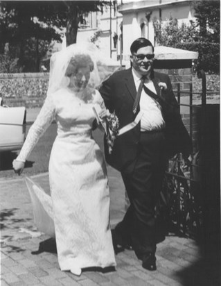Uncle Norman walks Mum up the aisle