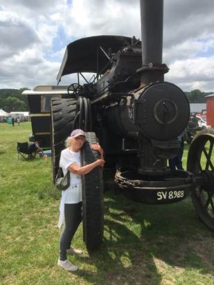 With her beloved steam engines 