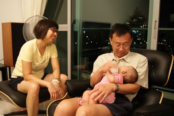 Holding a grand niece in Singapore, 2009
