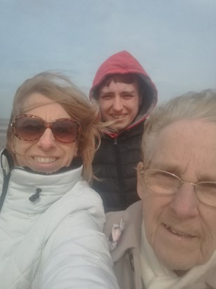 Mum Bev and Oliver windy day in Cleethorpes