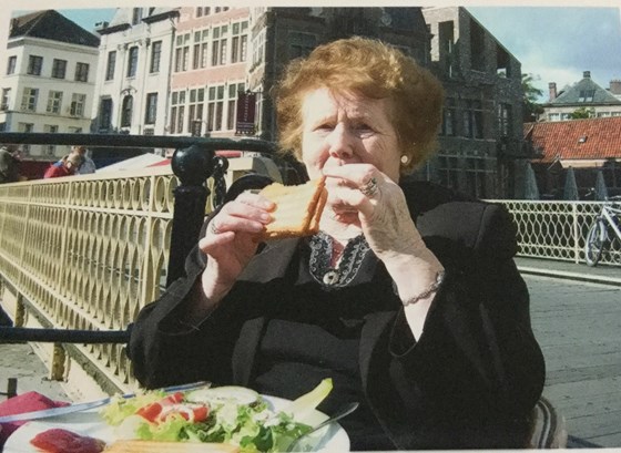 Cathy enjoying her lunch in Switzerland