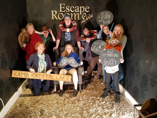 Gillian enjoying an escape room game with the kids and grandkids in the U.S.