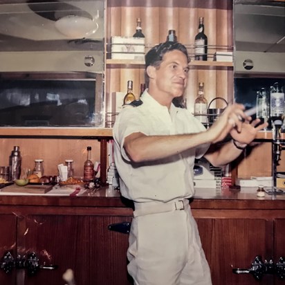 Dad conducting behind the bar, most likely on his beloved RMS Ruahine, New Zealand Shipping Co