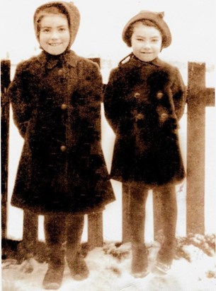 Mary and her sister Rita (right) as children