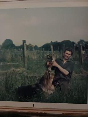 Dad up his yard with beloved Simba & my goat 🐕🐐