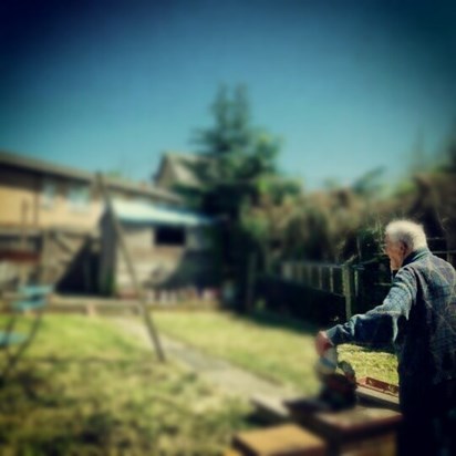 Grandad admiring his garden