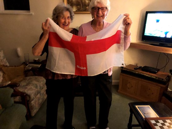 Pat had great sense of fun and here she is cheering England on with her friend Pam in Euros .