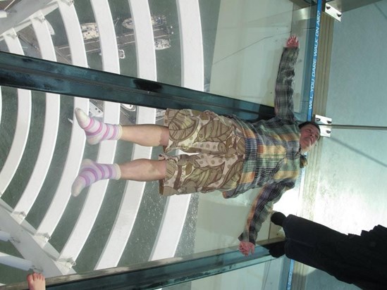 On the glass floor of the Spinaker (or Japonica) Tower in March 2012