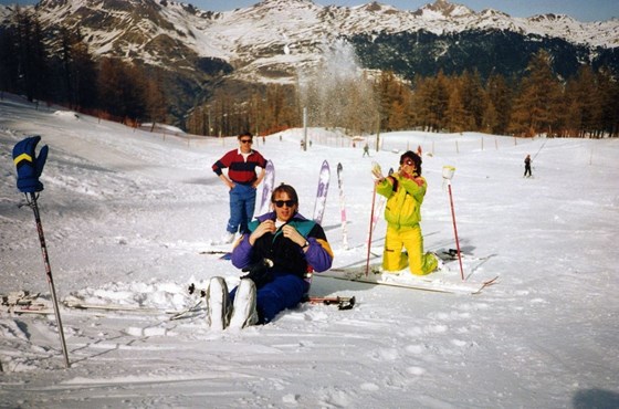 Susan throwing snow over Neil on ski slopes Feb 1992
