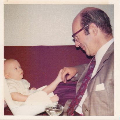 Philip on his christening day with his doting grandfather