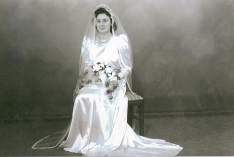Arva in her wedding gown