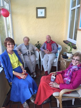 Enjoying a chat with her family.