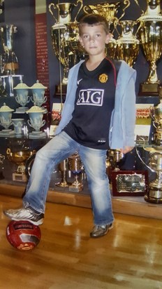 Ben at Old Trafford trophy room.
