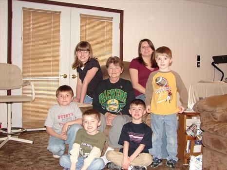 Mom with all the grandkids. She loved and still loves .