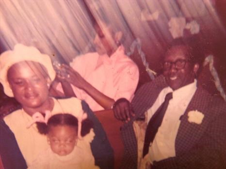 Left to Right: Mom, Tiffany in Mom's lap, Earline Taylor Price, Dad