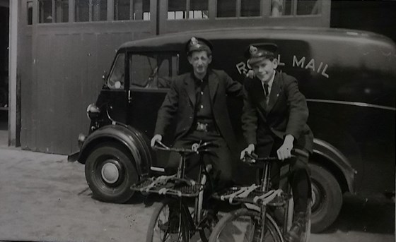 Peter (right) outside the Post Office