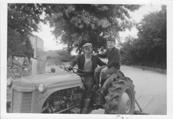 Michael and his Uncle Jack on the farm in Ireland.