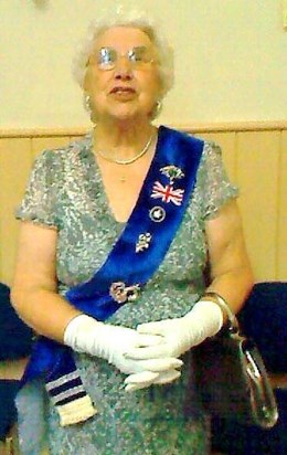 Di visiting the Brownies for afternoon tea dressed so convincingly as The Queen that many little girls went home that day believing they had been with Her Majesty.  For us she was royalty! Margaret Littlecott                               