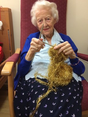 Mum knitting a scarf - Jan 2014