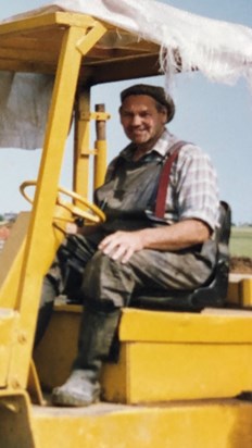 Dad at work with his cap on