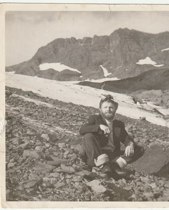 Picture of Dad looking at home in the mountains of South Georgia with HMS Owen.