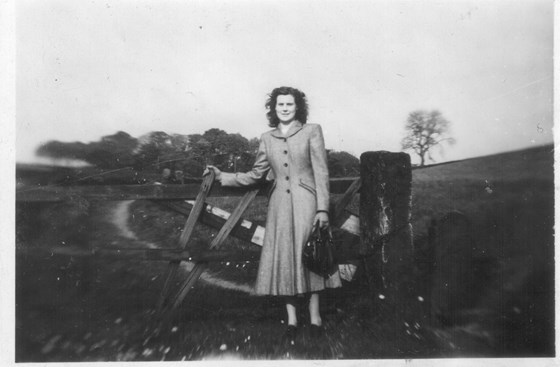 Mary, outside the first house she had with Ken at Shelf. 1947