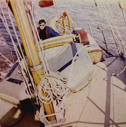 Doug at the helm of Flyanna, circa1975. Taken by Alan Freke in his early days learning to sail.