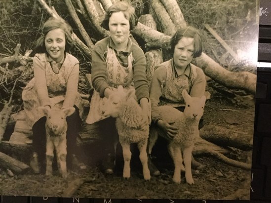 Joan (far right), sister Margaret (middle) with a friend during their evacuation.