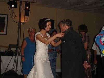 My wedding day. Dancing to "Staying Alive" with Dad
